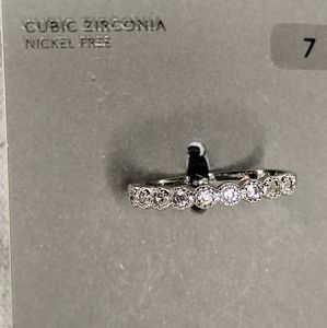 Beautiful CZ band in silver. Size 7. NWT